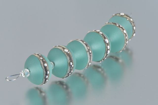 Frosted pale green beads